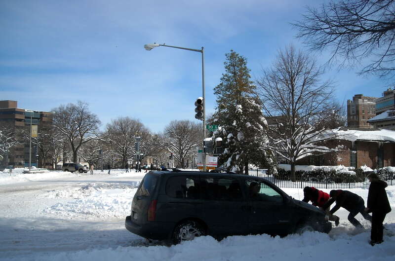 A Nissan Quest minivan stuck in the snow at 20th Street and Massachusetts Avenue, N.W., in the Dupont Circle neighborhood of Washington, D.C., following the North American blizzard of 2010.