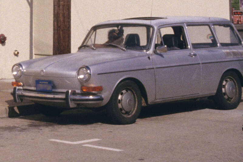 This is a 1973 Volkswagen (VW) Squareback model car. The Squareback was one of the VW Type 3 (http://en.wikipedia.org/wiki/Volkswagen_Type_3) vehicles. The seats were a kind of corduroy on the seat and the back, with vinyl on the headrest. The front