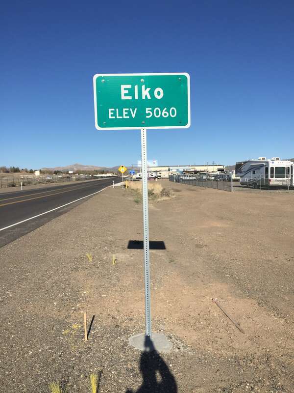 Entering &quot;Elko, 5060&quot; feet above sea level sign on Idaho Street (Nevada State Route 535 and Interstate 80 Business) in Elko, Nevada