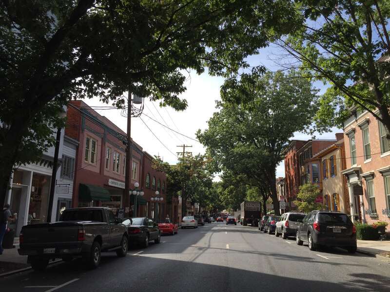 View west along Maryland State Route 144 (Patrick Street) at Carroll Street in Frederick, Frederick County, Maryland
