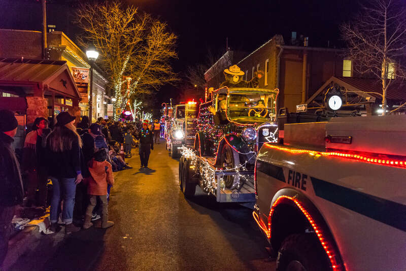 Smokey Bear joined Coconino National Forest employees and family members on our parade float at the Flagstaff Holiday of Lights, December 9, 2017. The crew decorated Engine 481 and the 1925 Dodge Brothers truck with holiday lights at the Flagstaff