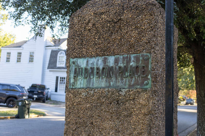 A photograph of an aggregate pillar marking the Audubon Place Historic District in Tuscaloosa, Alabama taken on October 21st, 2024.