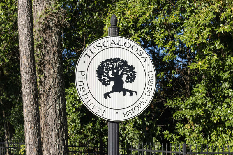 A photograph of a sign marking the Pinehurst Historic District in Tuscaloosa, Alabama taken on October 21st, 2024.