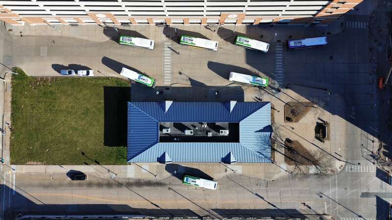 A view from above of the Appleton Transit Center with buses meeting during the hourly pulse period.