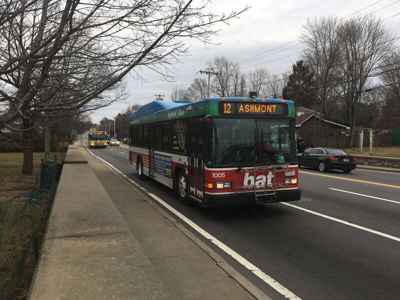 A northbound BAT route 12 bus in Randolph in January 2017, with an MBTA route 240 bus following