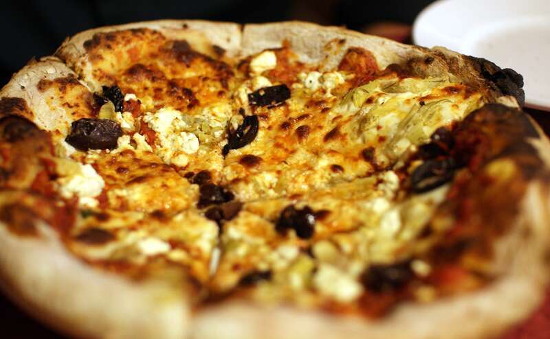 Zeffiro's Mediterranean pizza, with feta cheese, olives, and artichokes. From Las Cruces' new bakery/pizza joint, Zeffiro. It took much too long for a brick-oven pizza place to come to town.