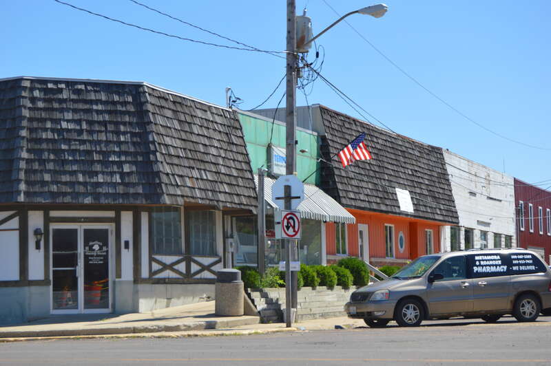 Buildings on the northern side of Broad Street, seen looking east from the Main Street intersection, in Roanoke, Illinois, United States.