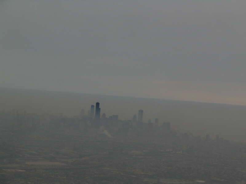 This photo doesn't do the scene justice.  Chicago's skyline looked really cool rising out of the smog, fog, and humidity layer.
Chicago, a city in the U.S. state of Illinois, is the third most populous city in the United States and the most populous