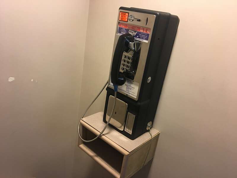 This is a payphone/coin-operated telephone