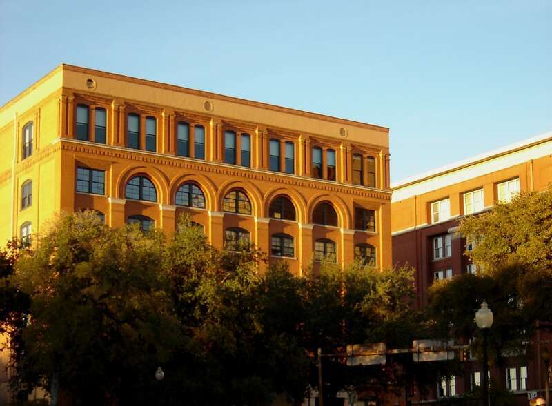 Dallas, TX, USA  --  Dealey Plaza and the Texas School Book Depository, in November 1969, site of the assassination of John F. Kennedy on 22 November 1963