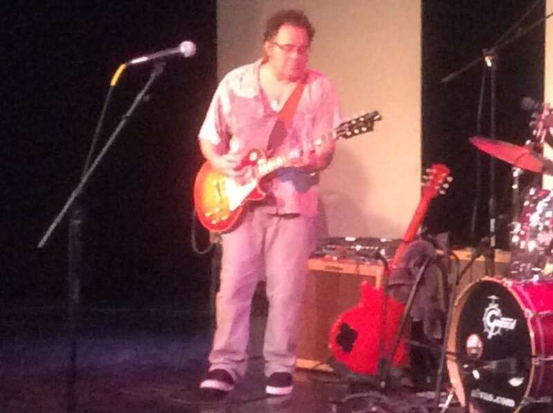 Singer/songwriter and guitarist Dave Widow onstage in San Pedro, California in 2014