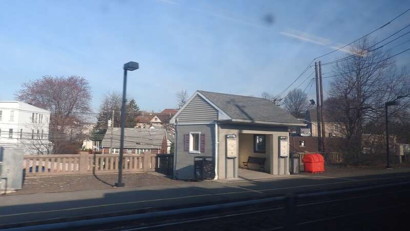 Looking west from a northbound train on a sunny morning.