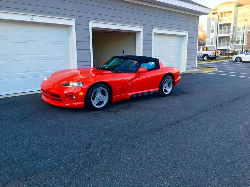 1994 Dodge Viper RT10 with its soft top and side windows on.