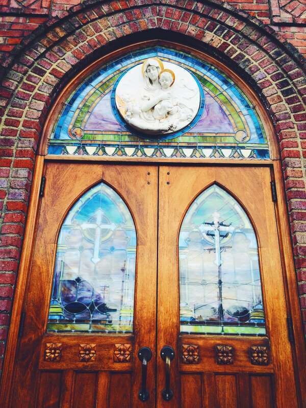 Front doors of St. Benedict Roman Catholic Church in Greensboro, North Carolina