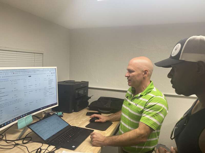 Dr. Lee Moorer At Castle Rock Mens Health with a person for Check Up