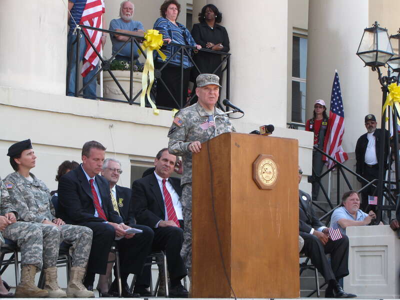 Georgia Army Guard Brig. Gen. Larry Dudney – now director of the Georgia Department of Defense Joint Staff – addresses a crowd of more more than 600 well-wishers who gathered in front of Macon City Hall in March 2009 to say their farewells to the