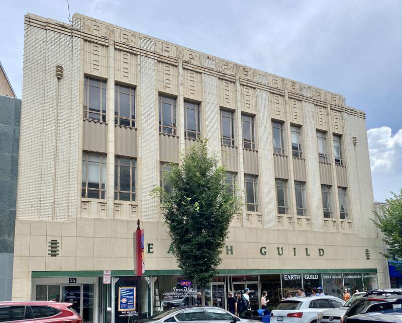 Built in 1937, this Art Deco-style building was designed by Ronald Greene and constructed by Frank Loughran and the L.L. Merchant Construction Company to house a location of the Bon Marche Department Store, a chain that once had locations in many