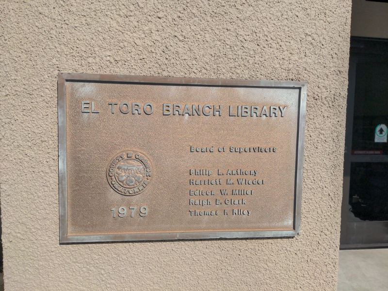 Plaque commemorating the 1979 founding of the El Toro Branch Library, in Orange County, California. The county seal is present. Board of Supervisors is listed as follows: Philip L. Anthony, Harriett M. Wieder, Edison W. Miller, Ralph B. Clark, Thomas