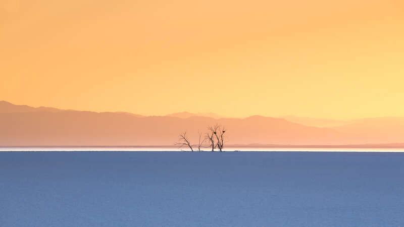 Sunset on the shore of Salton Sea.