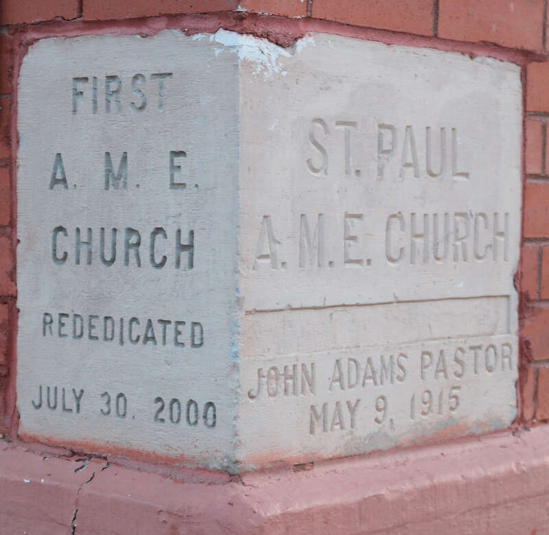 The cornerstone on the First African Methodist Episcopal Church building, located at 613 West Mesa Avenue in Pueblo, Colorado. The left side of the cornerstone says, &quot;First A. M. E. Church / Rededicated / July 30, 2000.&quot; The right side says, &quot;St.