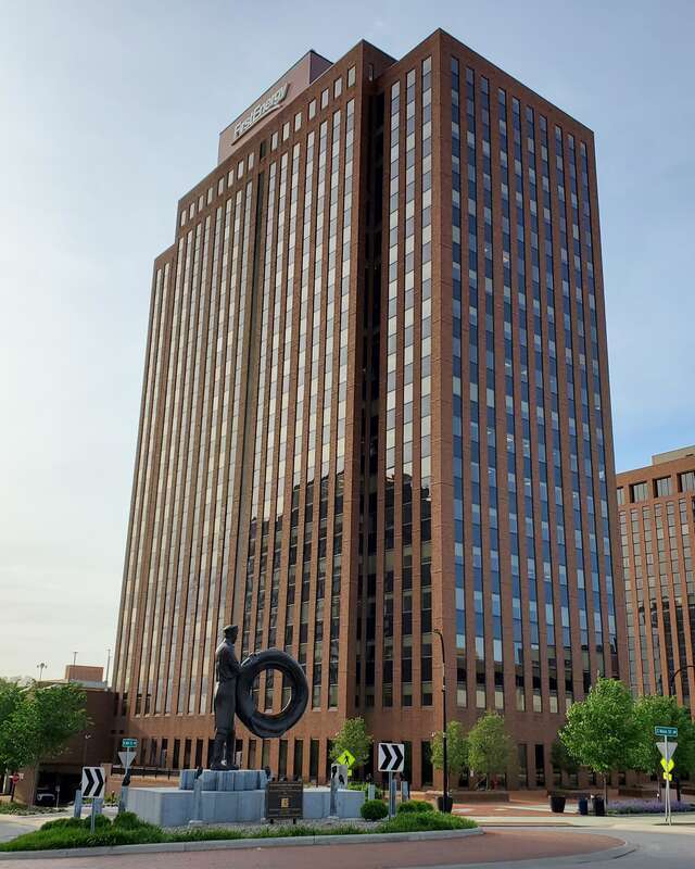 First Energy Tower in Akron with the Rubber Worker Statue in front