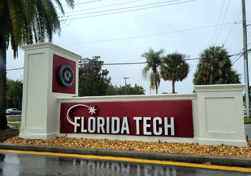 Sign at the intersection of S. Babcock St and W. University Blvd. near the campus of Florida Institute of Technology in Melbourne, Florida.