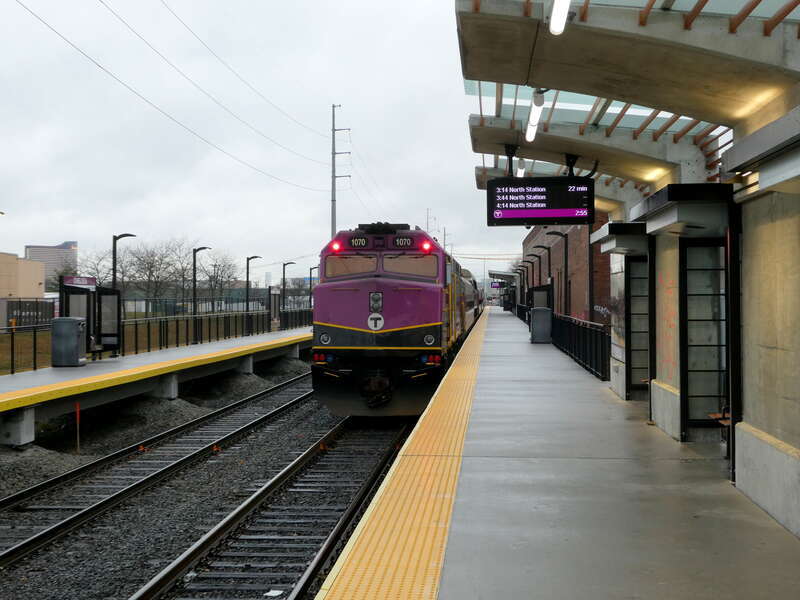 An inbound train leaving Chelsea station in December 2023