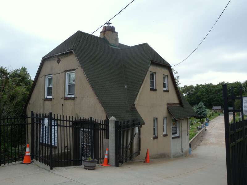 Looking south at gatehouse of Harsimus Cemetery on a cloudy afternoon.  See also File:JC Harsimus Cemetery jeh.jpg.