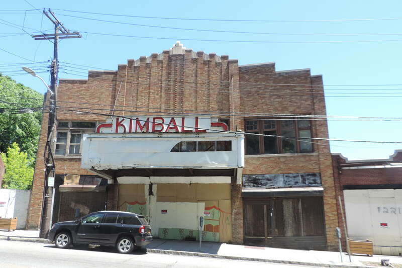 Looking east across Yonkers Avenue at closed Kimball Theater on a sunny afternoon.