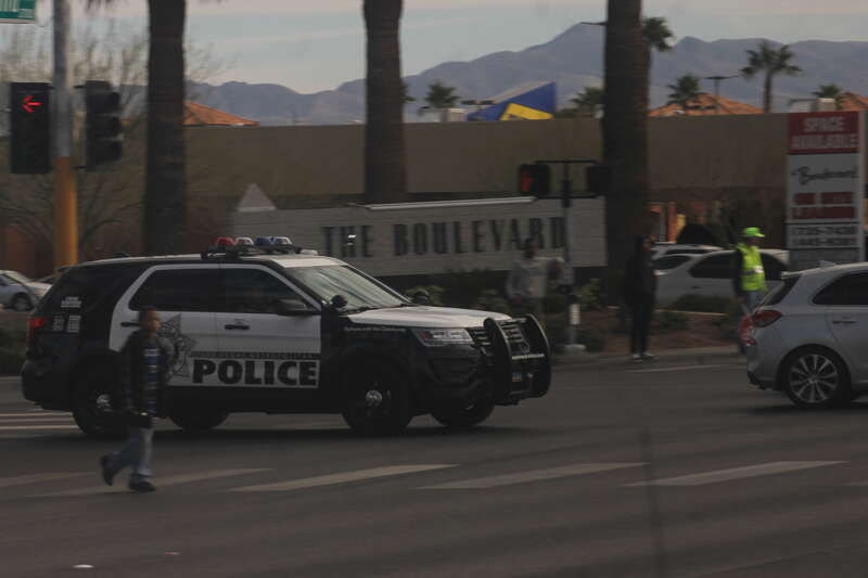 A 2016-19 Ford Police Interceptor Utility of the Las Vegas Metropolitan Police Department driving in the westbound lanes of East Twain Avenue, Las Vegas, Nevada.