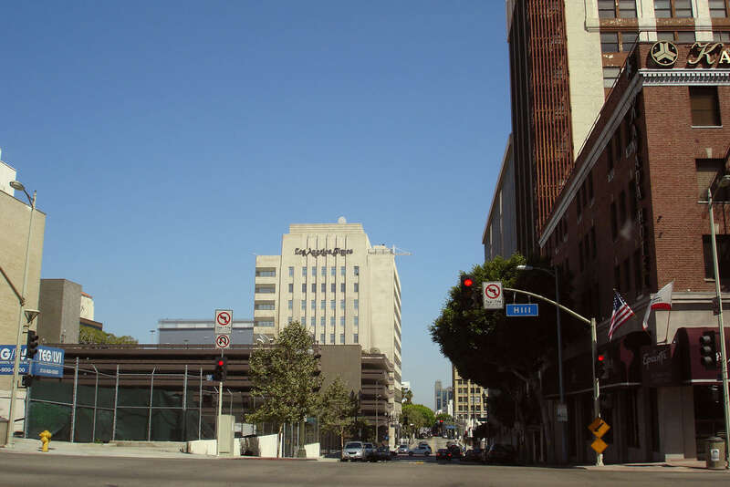 The Los Angeles Times building, the offices. This is a beautiful complex. Two orgasmic towers, old of Gotham city beauty, connected by a more contemporary 1970s building of gothic darkness, grayness, the kind that are hermetically sealed. Wrapping