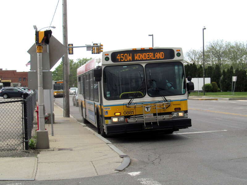 A route 450W bus on Western Avenue next to Lynn Garage in May 2017