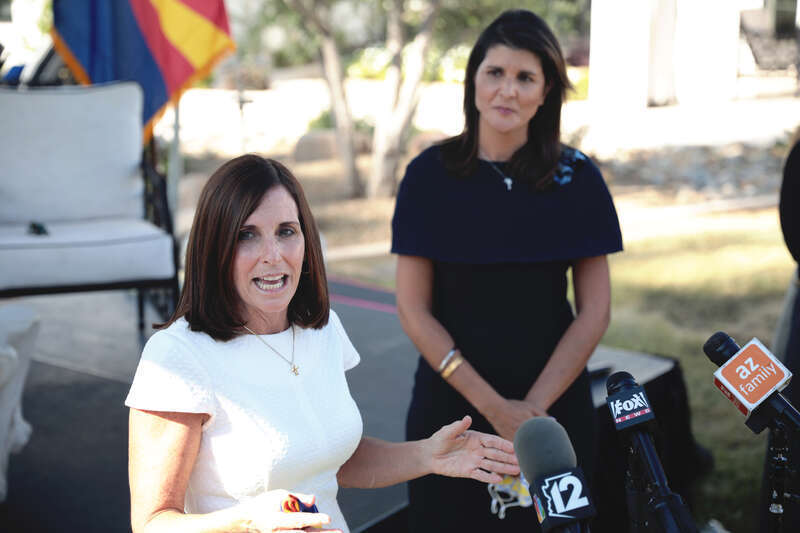 U.S. Senator Martha McSally and former United Nations Ambassador Nikki Haley speaking with the media after a campaign event at a home in Scottsdale, Arizona.

Please attribute to Gage Skidmore if used elsewhere.