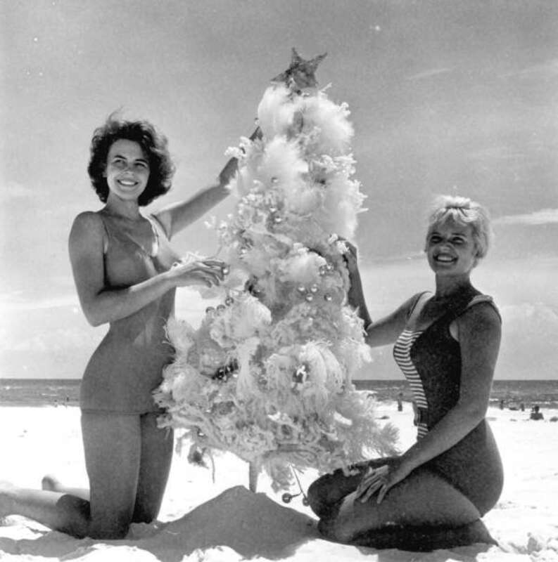 Local call number: C620159
Title: Meriam De Shazo and Kenna Morris modeling with a Christmas Tree on Pensacola Beach
Date: August 1962
Photographer: Jim Stokes
Physical descrip: 1 photoprint - b&amp;amp;w - 2 x 2 in.
Series Title: Department of Commerce