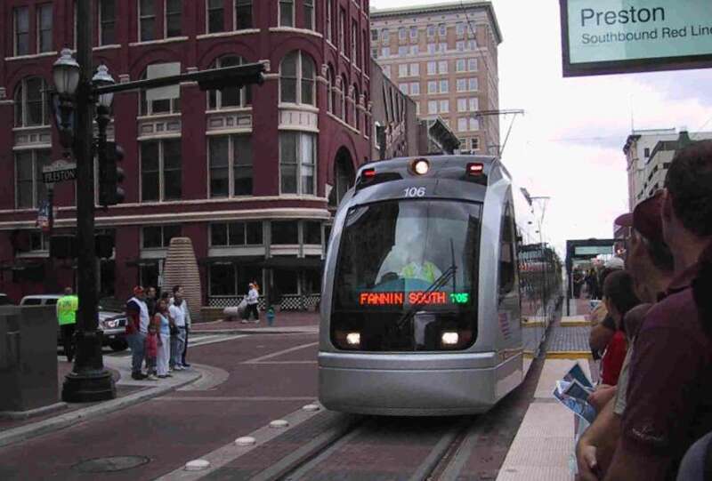 A METRORail train approaching Preston Station in downtown Houston, Texas, USA.