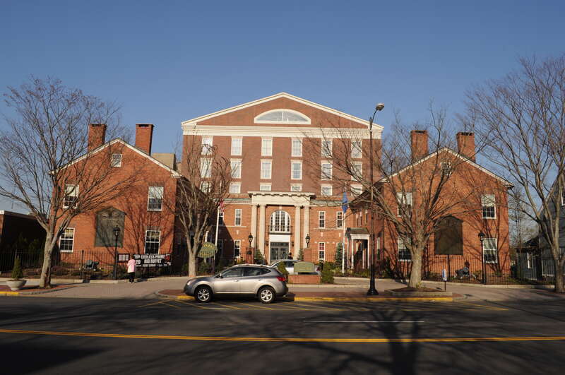 Inn at Middletown (former State Armory), 70 Main Street, Middletown, Connecticut, USA.  The U-shaped combination building, built 1921, incorporates the John R. Watkinson House, built c. 1810 as its north arm (on the left as you are facing it); the