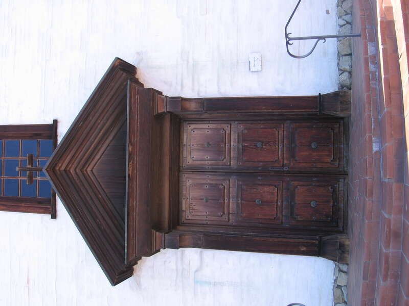 The front door of the Mission San José (California) in the Mission San José district of Fremont, California, USA.  View is looking east from the plaza in front of the building along Mission Boulevard.