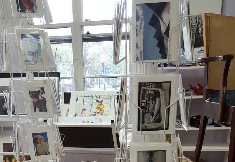 The Capital District Tourism Gnome loves to buy postcards and more at the National Upholstery in Albany, New York. Lark Street.