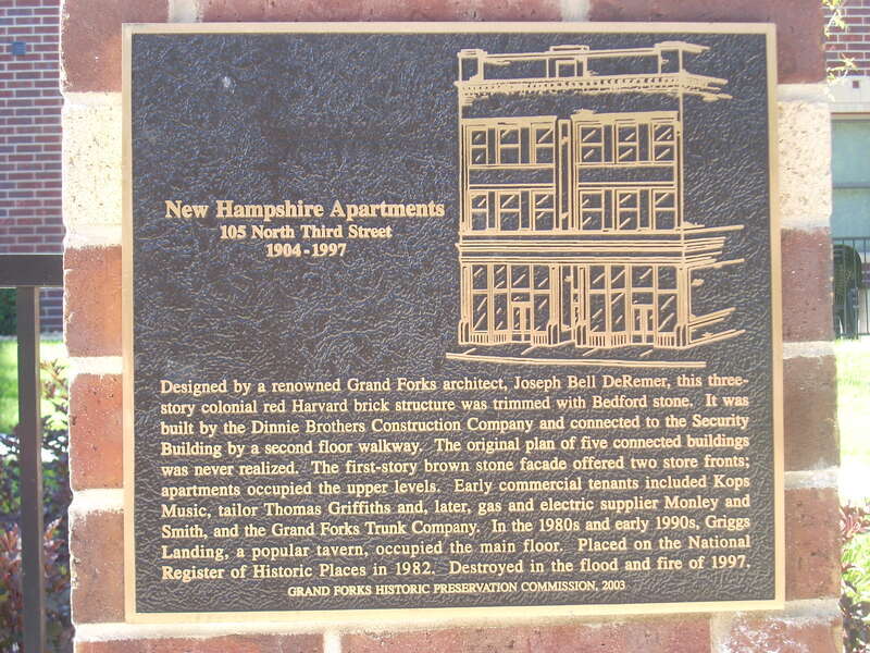 Plaque marking the former location of the now demolished New Hampshire Apartments at 105 N 3rd St, Grand Forks North Dakota.  Added to the National Register of Historic Places Oct. 26, 1982.  Destroyed the Red River flood and fire of 1997.
