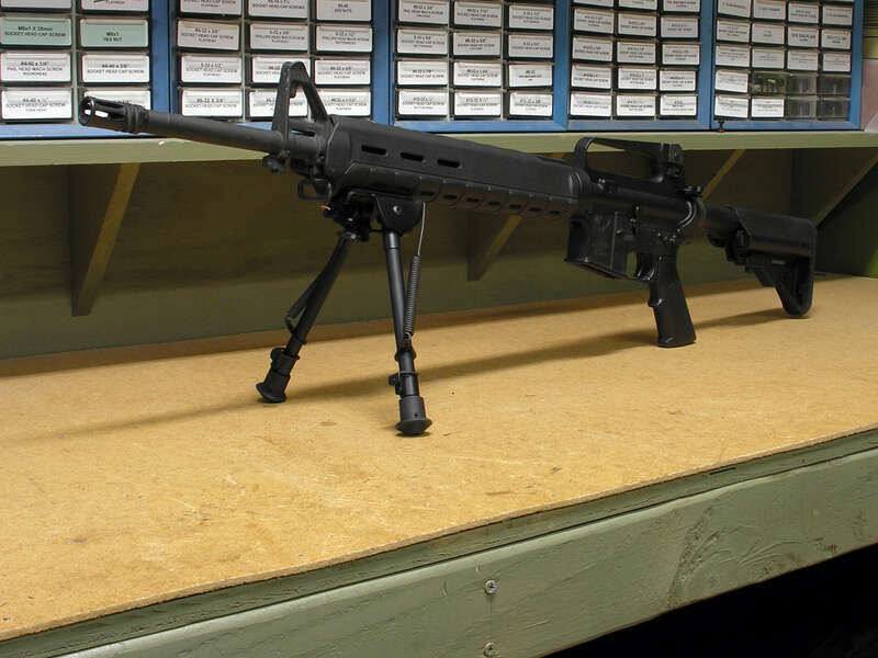 Was working on some rifles today and I thought I'd photograph this venerable AR-15 in a couple of poses.
My first AR-15, I put it together in 2006 or 2007, from a Stag Arms stripped lower and a DPMS A2 rifle upper.  It has been fitted with a variety