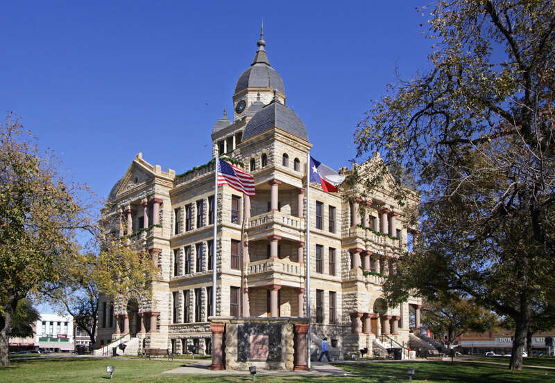 The Denton County, Texas courthouse located at  33.2151° -97.1331°, Denton, Texas, United States. The Romanesque style structure was added to the National Register of Historic Places in 1977.