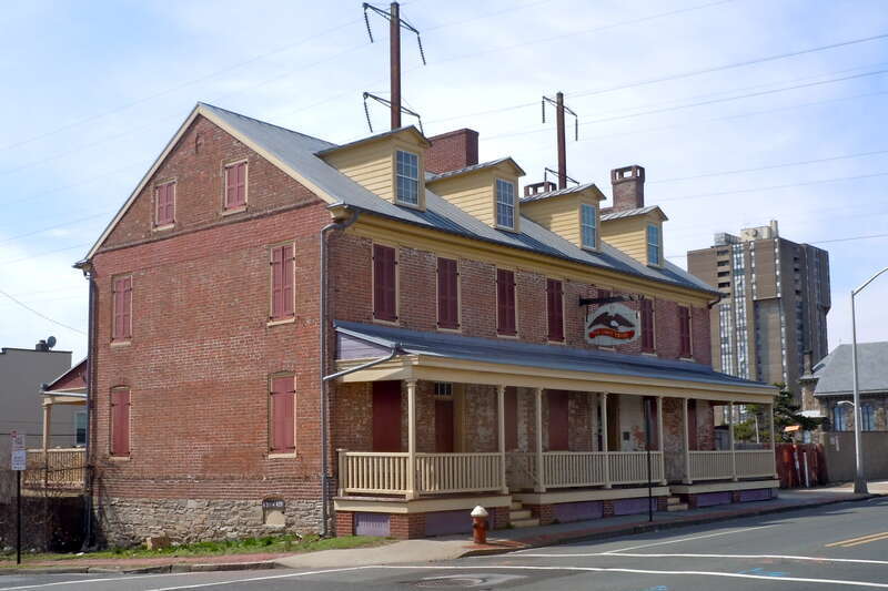 Old Eagle Tavern on the NRHP since November 3, 1972 at 431, 433 S. Broad St., Trenton, New Jersey.  Colonial era tavern next to the interstate highway.