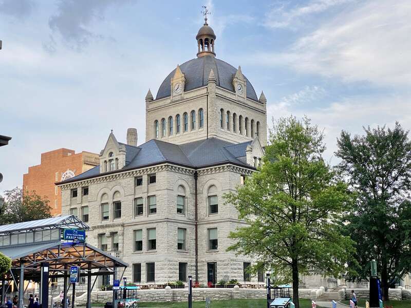 Built in 1898-1900, this Richardsonian Romanesque Revival-style building was designed by Lehman and Schmitt to serve as the Fayette County Courthouse, and is the fifth courthouse to serve Fayette County, replacing a previous courthouse, built in