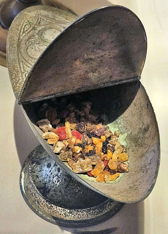 Front view of an open incense boat that was used to store incense at Mission San Luis Rey in Oceanside, California, USA.