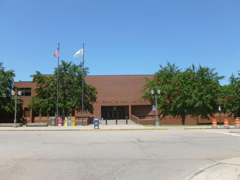 Quincy District Court, also known as District Court of Eastern Norfolk.  Located at 1 Dennis Ryan Parkway, Quincy, Massachusetts.  South (front) side of building shown.