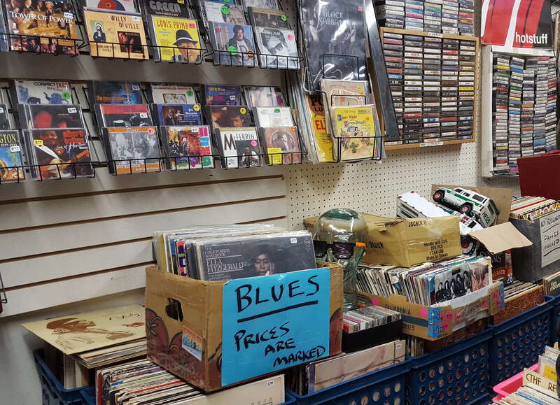 The Recollector is a vintage shop with records, books, collectibles, game consoles, and more. The Capital District Tourism Gnome enjoyed browsing on Jay Street Marketplace.