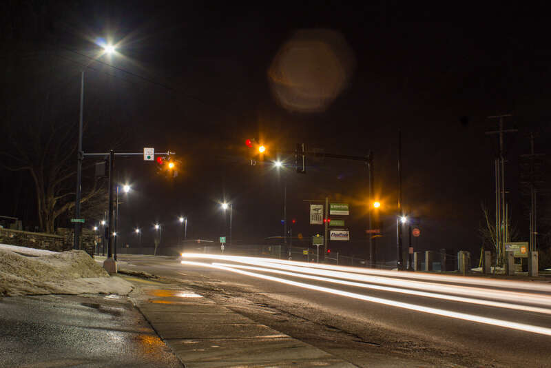 Automobile light trails on a portion of Riverside Avenue looking southbound. Both U.S. Routes 2 and 7 run on Riverside Avenue. This was taken in Burlington, Vermont near the Winooski River.
