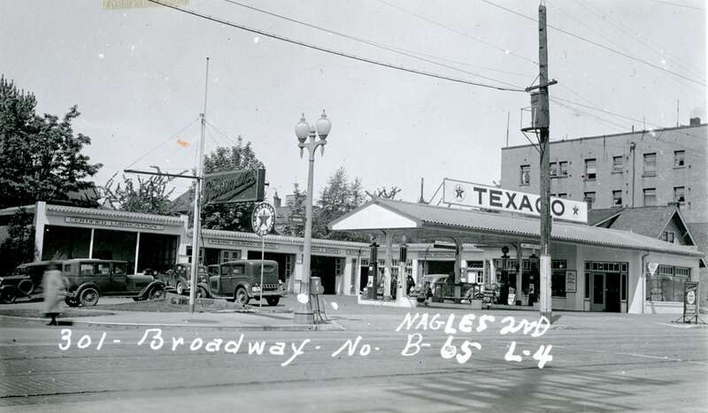 This super service station as at 301 Broadway East (Broadway North at the time) in the Broadway part of Capitol Hill.
It was built as Reardon &amp;amp; Spence, and opened on July 1, 1926. At that time the store sold Standard Oil gasoline. The opening day