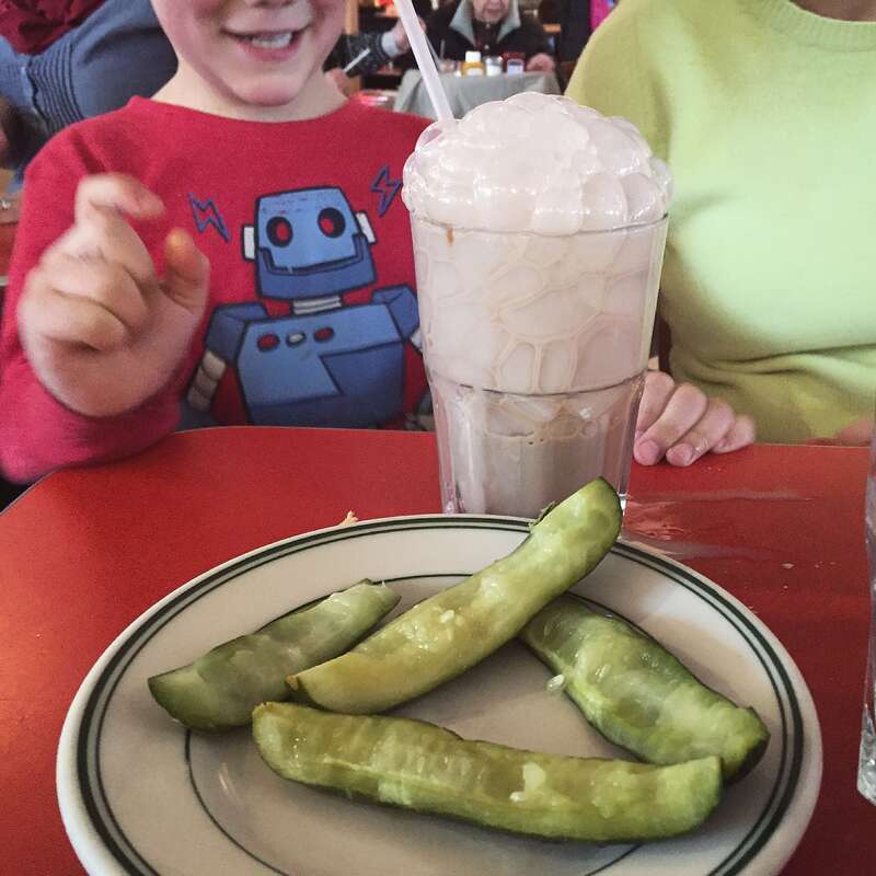 Michael's lunch: Pickles (no skins). Chocolate milk.