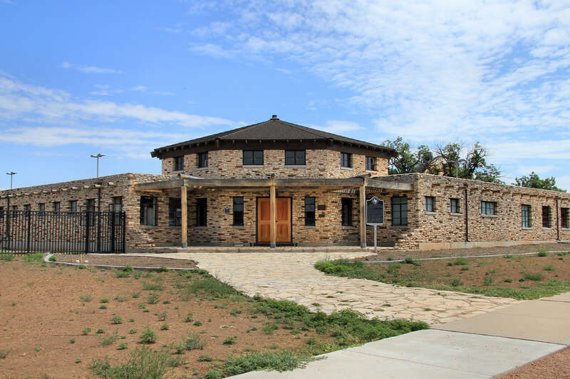 San Angelo, Texas Municipal Swimming Pool building. The Works Progress Administration assisted with funds to help build the stone Pueblo Revival style building in 1938. The pool complex was listed on the National Register of Historic Places on